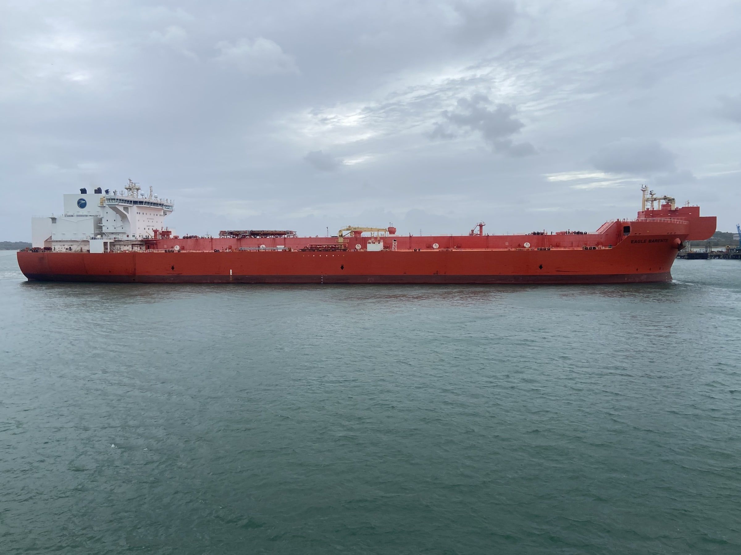 Red-hulled tanker Eagle Barents under way - photograph by Simon Daniels