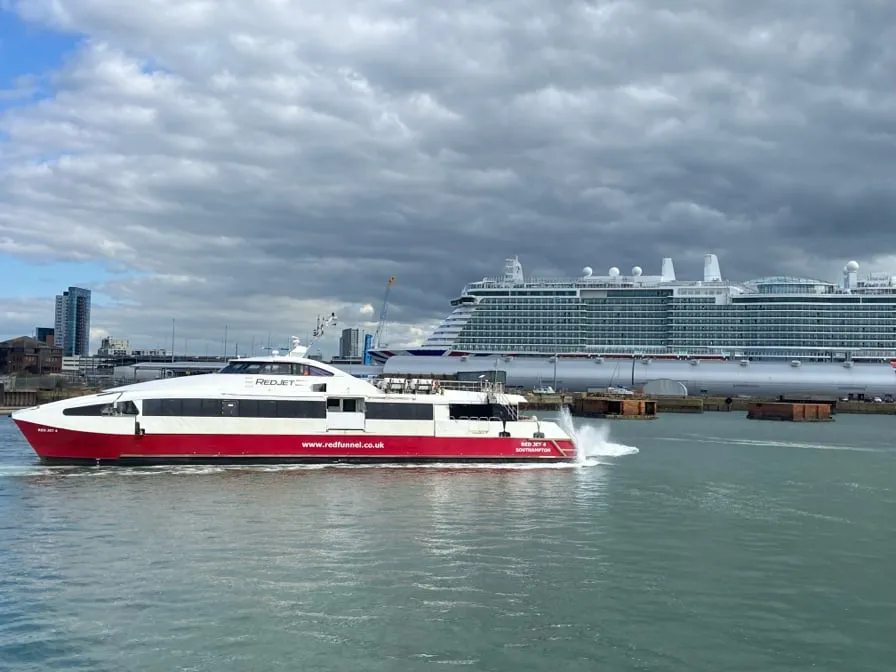 Red Funnel Red Jet passing a cruise ship in Southampton - photograph by Simon Daniels